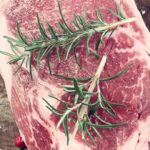 Chuleta de cerdo con naranja caramelizada